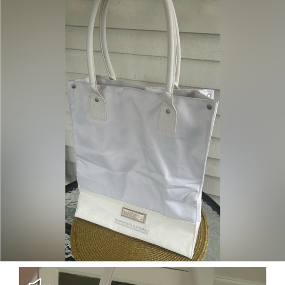 LACOSTE PARFUME WHITE TRAVEL TOTE. EUC - Picture 1 of 8
